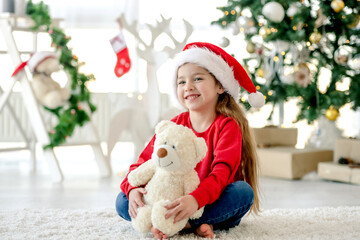 Fototapeta premium Child girl in Christmas time