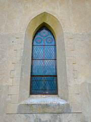 Fototapeta na wymiar Rosenfenster der evangelische Dorfkirche aus dem 18. Jahrhundert