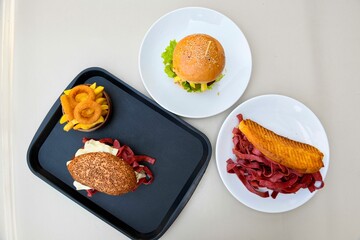 Delicious meat kebab with fresh vegetable salad served with variety of Turkish dishes and appetizers. Top view of assorted Turkish food and meze, tasty and healthy Mediterranean cuisine.