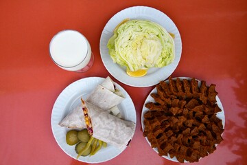 Table scene of assorted take out or delivery foods. Traditional Turkish cuisine. Various Turkish meal and appetizers. Top down view on a table.
