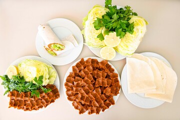 Steak a la turca or chee kofta on a plate( Cig Kofte )  - Turkish Food.