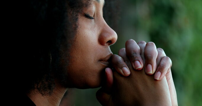African woman praying to God
