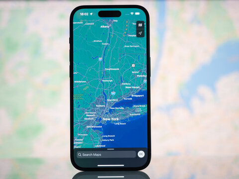 Galati, Romania - October, 03 2022: Apple Maps with New York on an iPhone 14 Pro. Apple Maps is a service that provides information about geographical regions and sites around the world.
