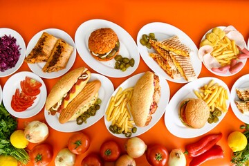Traditional Turkish cuisine. Pizza, pita, pidesi, sucuk, hummus, kebab. Many dishes on the table. Serving dishes in restaurant. Background image. Top view, flat lay