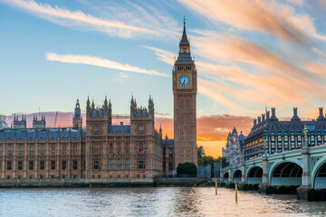 Fototapeta na wymiar Big Ben against dramatic sky, beautiful evening cityscape