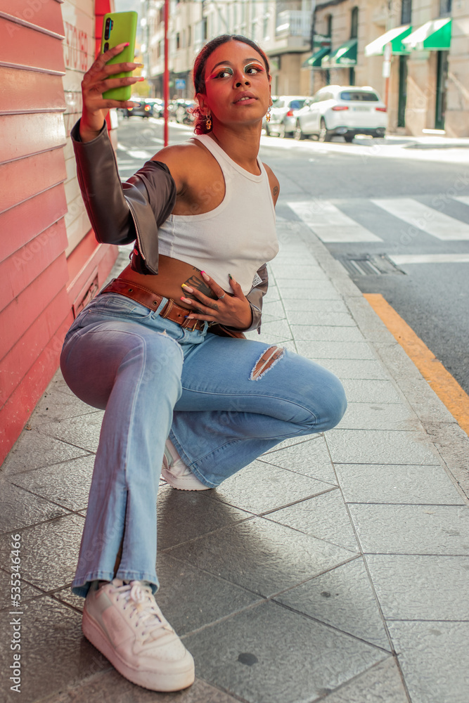 Canvas Prints urban millennial taking selfie on city street