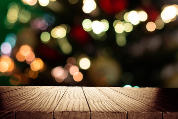 Blurred Christmas background with empty wooden table in focus. Empty display for product assembly