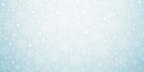 Background of complex big and small Christmas snowflakes in light blue colors. Winter illustration with falling snow