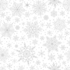 Seamless pattern with complex big and small Christmas snowflakes in gray colors. Winter background with falling snow