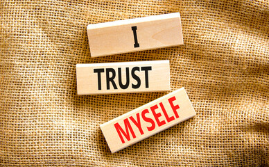 I trust myself symbol. Concept words I trust myself on wooden blocks. Beautiful canvas table canvas background. Business, psychological and I trust myself concept. Copy space.