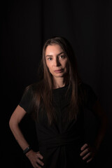 Naklejka premium beautiful mature woman dressed in black