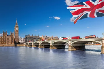 Foto op Plexiglas Famous Big Ben with red buses on bridge over Thames river in London, England, UK © Tomas Marek