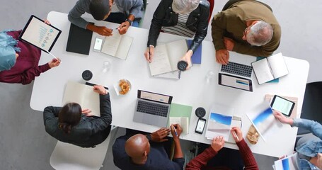 Planning meeting, report and business people in collaboration for corporate partnership, consulting about strategy with tech and workshop at work. Team of employees working for innovation in office