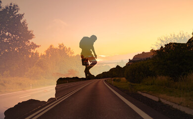 Man climbing up mountain. setting goals,. path road to victory concept. 