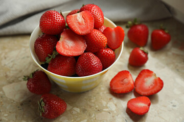 Fresh juicy strawberries on table, closeup view
