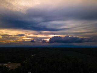 View over sunset over Amazon river with rainforest in Brazil.