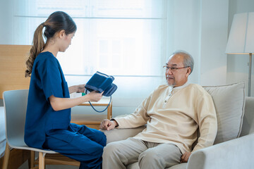 Nurse caregiver with senior man using blood pressure tool at home or nursing home.