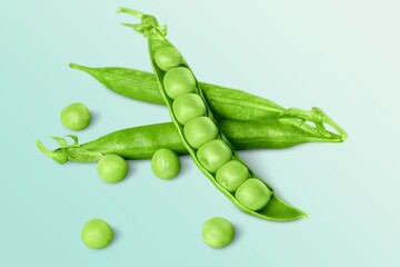Perfect tasty green peas in pod on the desk