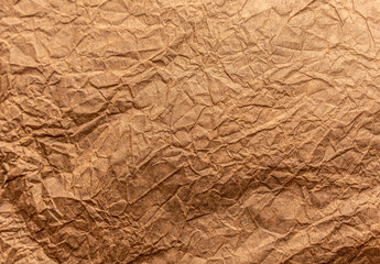 Abstract wrinkled wrinkled texture of wrapping brown paper. Abstract background