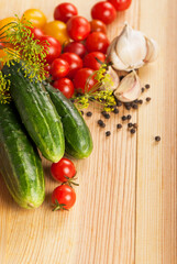 fresh cucumbers, tomatoes of cherry and fennel branch