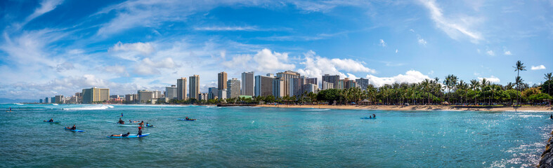 Fototapeta na wymiar Surfers at Waikiki Beach, Honolulu, Hawaii