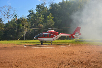 Red helicopter landing