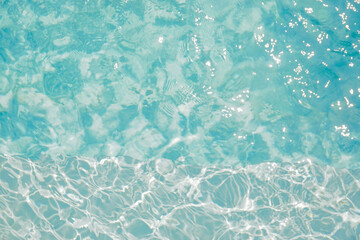 Closeup and crop reflection of water in the pool.