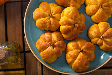 Pumpkin buns on a wooden table