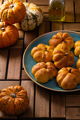 Pumpkin buns on a wooden table