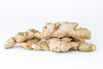 pile of ginger on white background