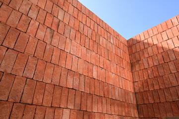 Naklejka premium brown brick wall textured, construction industry