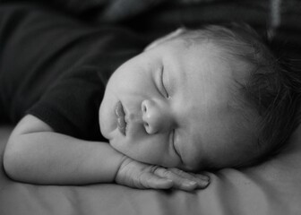 Monochrome photo of sleeping baby