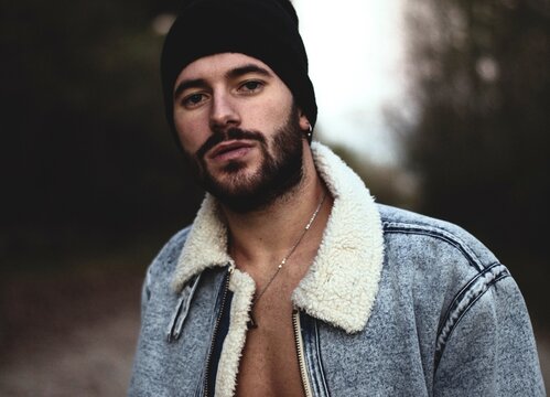 Man Wearing Jacket And Black Beanie