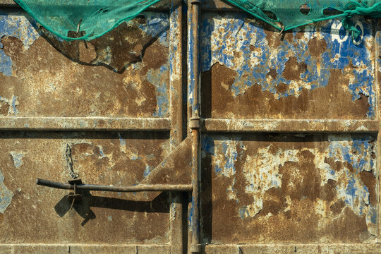 Rusty truck body. Metal rust closeup. Background, texture