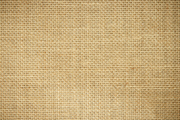 Jute hessian sackcloth burlap woven, linen texture pattern background in light beige cream brown color blank. 