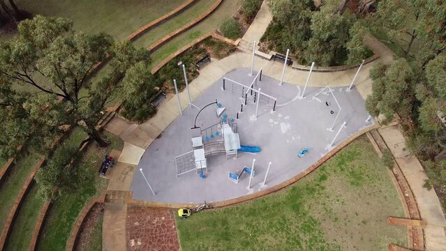 Aerial Ascending View Over Round Playground, Las Ramblas Park, Clarkson, Perth