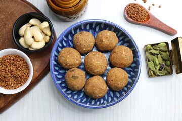 Gond and Methi Ke Laddu or Pinni. Fenugreek Laddu Made From Fenugreek Seeds, Saunf, Jaggery, and nuts. Immunity booster food for winters. Copy space