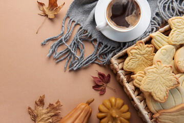 Fototapeta Cup of coffee, cookies on tray, yellow leaves. obraz