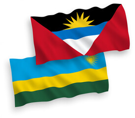 National vector fabric wave flags of Republic of Rwanda and Antigua and Barbuda isolated on white background. 1 to 2 proportion.