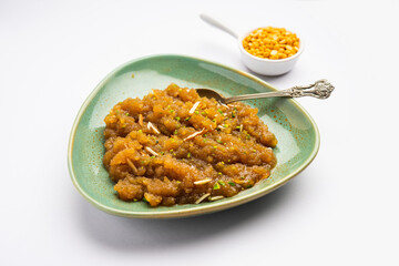 Besan Halwa, shira, sheera is a rich dessert made with gram flour, ghee and sugar