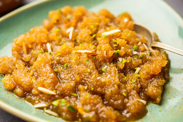 Besan Halwa, shira, sheera is a rich dessert made with gram flour, ghee and sugar