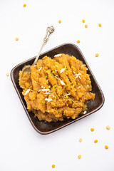 Besan Halwa, shira, sheera is a rich dessert made with gram flour, ghee and sugar