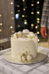 Beautiful wedding cake with elements of wedding rings. Wedding celebration.