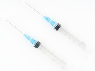 Syringes on a white background. Closeup. View from above