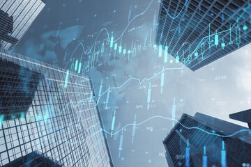 Global market and real estate concept with digital financial chart graphs, candlestick and world map on city skyscraper tops view background, double exposure