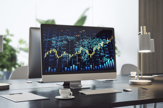  workplace with creative forex chart with candlestick graph, index and tech hologram on computer monitor, coffee cup and supplies on office background with window and blurry city view.