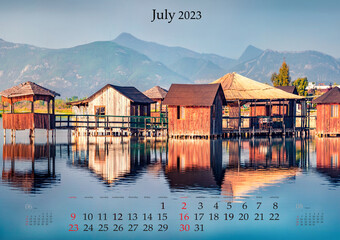 Horizontal wall calendar for 2023 year. July, B3 size. Set of calendars with amazing landscapes. Calm view of fishing dock on Patocut Laguna, Adriatic, Albania. Monthly calendar ready for print..