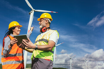 Windmill engineer inspection and progress check wind turbine at construction site