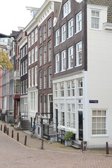 Amsterdam Amstel Street View with Traditional House Facades, Netherlands