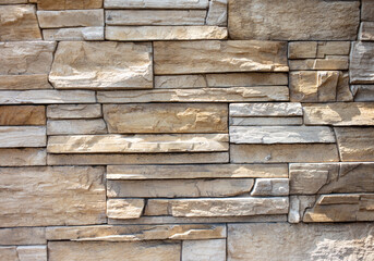 Decorative decoration with bricks on the wall of the house.